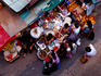 People at fruit stall on Cage Street.