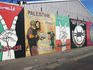 Wall murals along Falls Road.