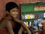 Cigarette stall proprietor in Sudder Street.