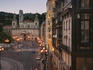 Streetlights, church and streetscape at sunset near Plaza Santiago, Bilbao
