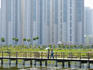 People on walking trail through the Hong Kong Wetland Park, Tin Shui Wai, New Territories.
