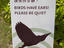 Bird sign on walking trail through the Hong Kong Wetland Park, Tin Shui Wai, New Territories.