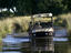 vehicle crossing waters of Delta, Botswana