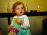A young girl tucks into a packet of crisps - Dublin, County Dublin