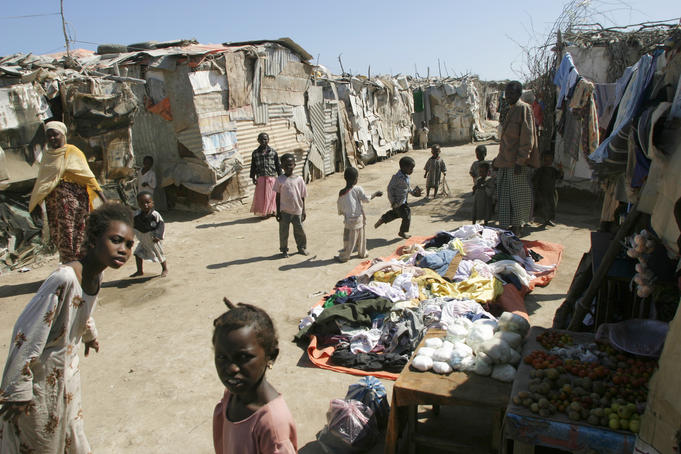 Clothes, fruit and vegetables for sale in a Bosaso slum.