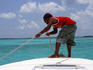 Boy on deck of boat, near Blue Hole.