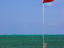 Jetty with flag, Caye Caulker