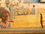 Man walks past a mural, USA
