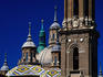 Tower, spires and tiled roofs of Basilica of Nuestra Senora del Pilar.