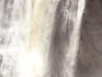 People standing below Montmorency Falls.