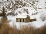 Abandoned snow covered house near Snowmass Village.