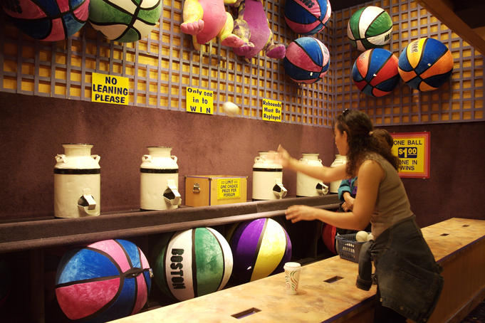 Woman playing ball game in the Midway, Circus Circus.