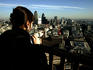 Woman looking from Golden Gallery, St Paul's Cathedral.