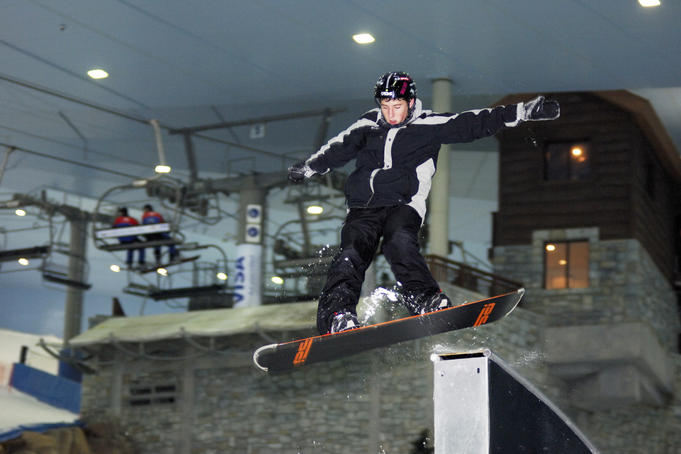 Snowboarder during Ski Dubai freestyle night.