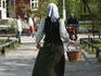 Woman in period costume at Skansen.