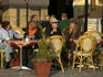People drinking outside a cafe, Old Town Square.
