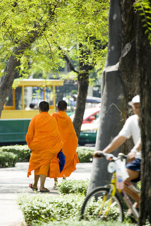 Monks walking along street, Ko Ratanakosin.