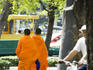 Monks walking along street, Ko Ratanakosin.