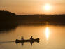 Canoe at sunset on Lake Zotzensee, Mecklenburgian Lake District.