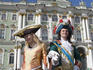 Period-costumed Russians outside the Winter Palace.
