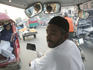 A rickshaw driver looks for customers to take to The Gold Market, Shai Mahala.