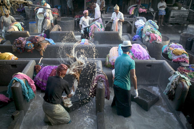 Washing clothes in the dhobi ghats.
