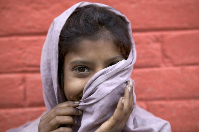 A child poses for a picture.