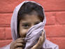 A child poses for a picture.