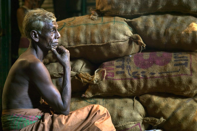 Market worker takes a break.