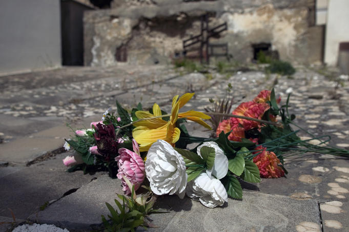Bouquets on cobblestones, Sicilian City of the Dead.
