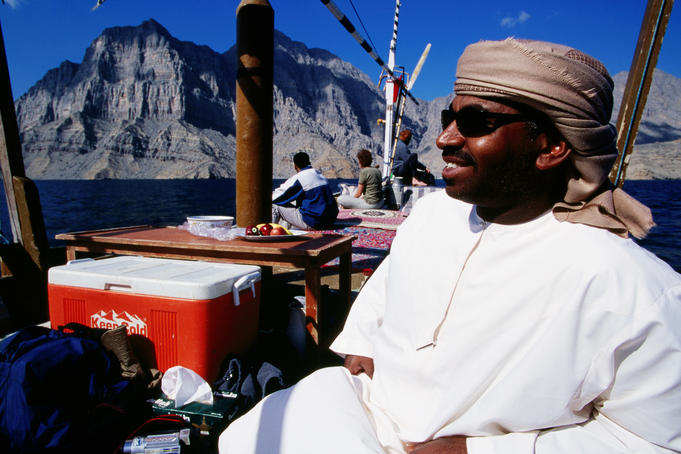 Smiling captain of a dhow cruise.
