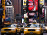 Traffic and neon signs in Times Square.