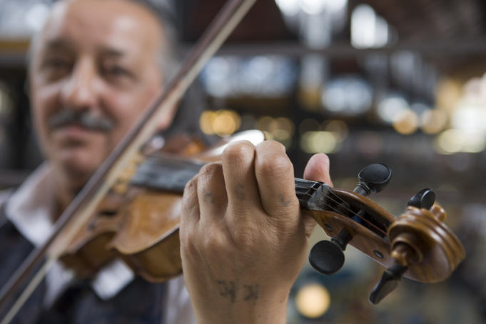 Gypsy violinist in Central Market Hall.