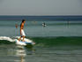 Longboarder on small wave.