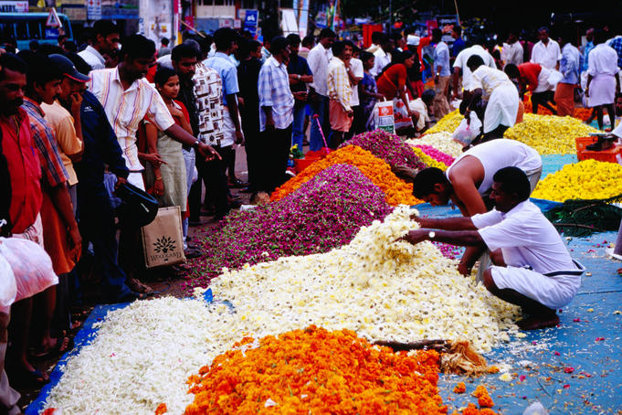 Flowers for sale at street market on the eve of the Onam festival.