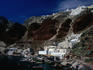The violent volcanic history of Santorini Island, southern Cyclades Islands has produced some wonderful lava layered cliffs and a submereged caldera ( crater ) from the biggest volcanic eruption in recorded history.
