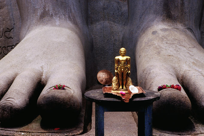 Miniature replica at the feet of the statue of Jain deity Gomateshvara (Bahubali) on Vindhyagiri Hill.