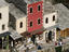 Overlooking the old buildings and cobbled street of Kujundziluk (east side of bridge) lined with souvenir shops.