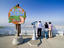 Tourists enjoying the view over the city from the summit of Mount Moiwa.