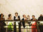 Patrons on balcony of Sydney Opera House.