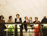 Patrons on balcony of Sydney Opera House.