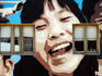 Wall mural of woman's face.