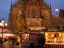 Christmas Market and Gothic Pfarrkirche Unsere Liebe Frau Church (Frauenkirche) at dusk, Haupt-markt Square.