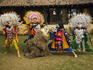 Costumed Chhau dancers (from Purulia in West Bengal) performing a traditional dance, Crafts Museum.