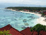 Overlooking fishing boats and the beach.