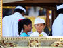 Young girl and boy during a ceremony.