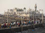 Long column of people make their way to Haji Ali's Mosque.
