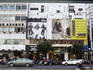 Advertising signs on billboards.