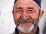 Smiling man, Xinaliq.