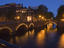 Lights along canal bridges at famous 'Golden Bend' in the city centre.